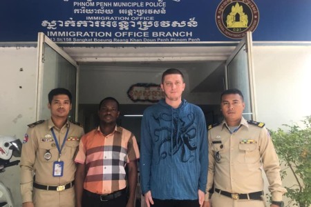 Russian and Ghanaian Hand Themselves To Immigration