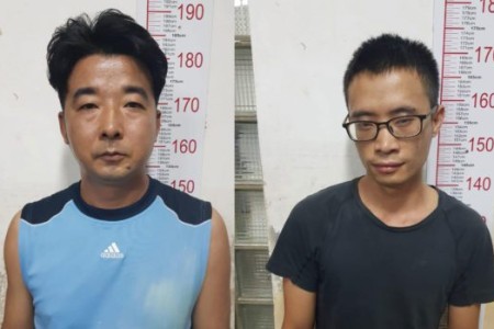 Two Chinese Arrested After Fire