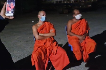 Monks Arrested With Beer & Dice & Police Uniform