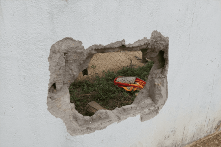 Prisoners Break Out Through Hole In The Wall